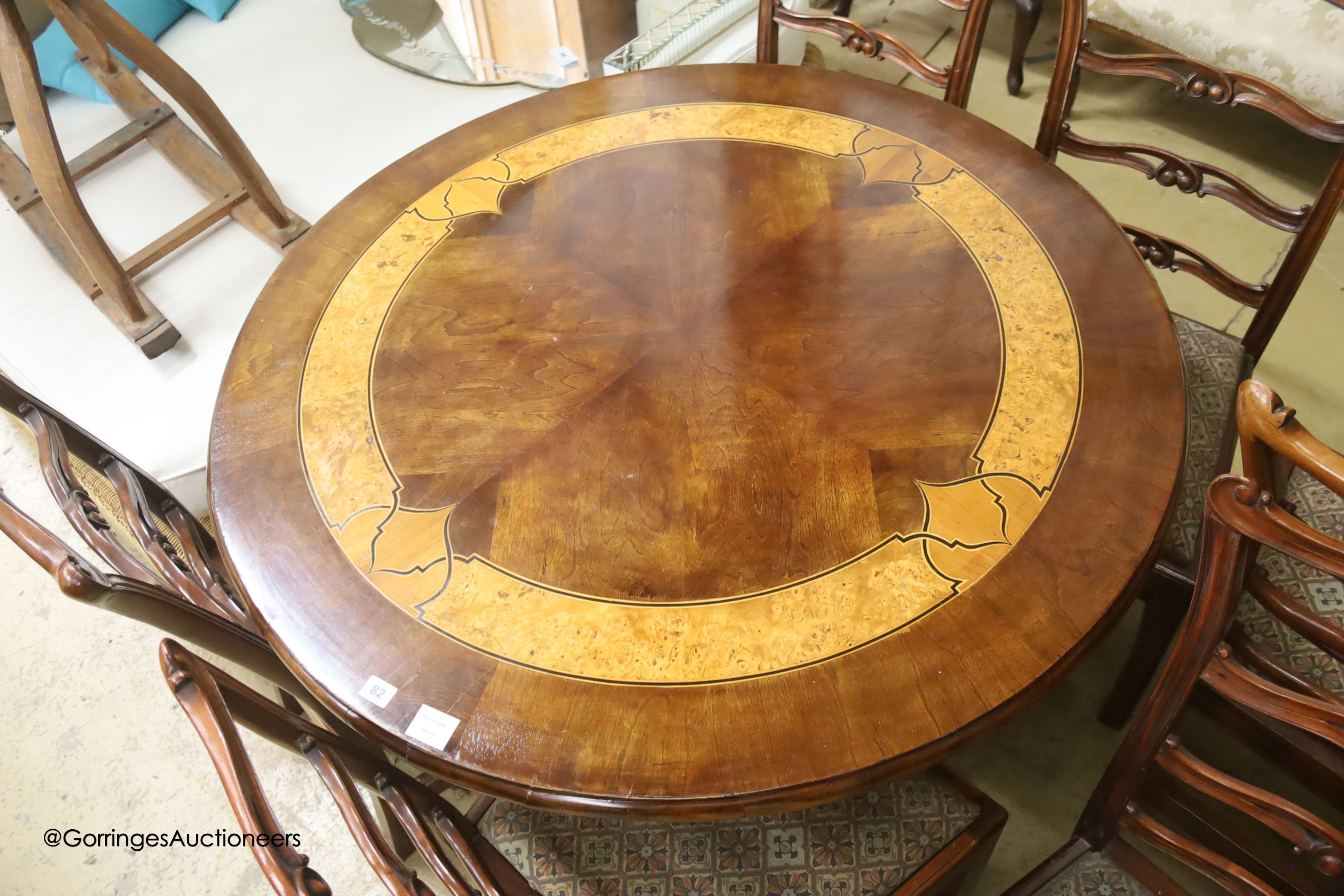 A parquetry inlaid circular centre table, 112cm diameter